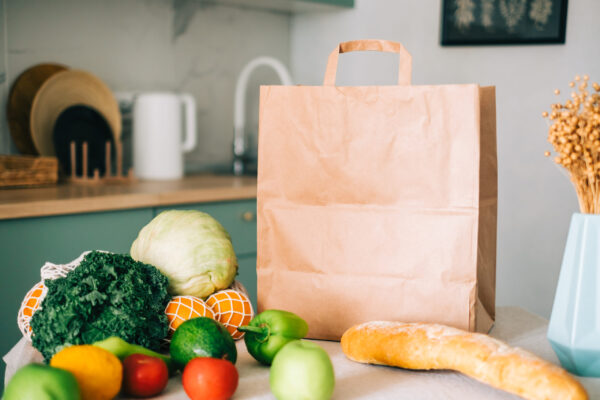 eco shopping paper bag with fresh vegetables and b 2026 01 06 00 49 57 utc