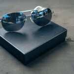 new dark aviator glasses on grey concrete backgrou 2026 01 08 22 37 09 utc