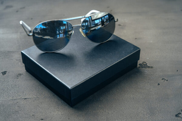 new dark aviator glasses on grey concrete backgrou 2026 01 08 22 37 09 utc