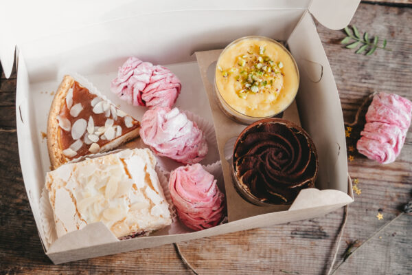 open box with different cakes and marshmallows on 2026 01 08 07 15 54 utc