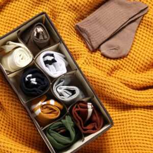 organizer with different socks on orange blanket 2026 01 11 11 11 03 utc