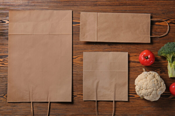 paper eco bags with fresh vegetables on wooden bac 2026 01 11 09 31 58 utc