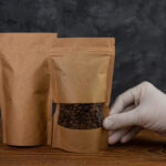 pouch bag mockup hand in protective gloves holds 2026 01 07 23 08 00 utc
