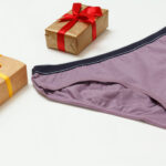 purple cotton panties and gift boxes on the white 2026 01 11 09 12 09 utc