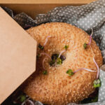 salmon bagels packed in the paper box top view 2026 01 11 09 31 28 utc