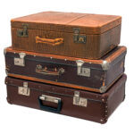 stack of old leather vintage suitcases isolated on 2026 01 11 10 12 59 utc