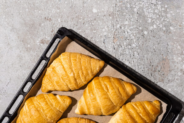 top view of baked delicious croissants on baking t 2026 01 06 00 43 57 utc