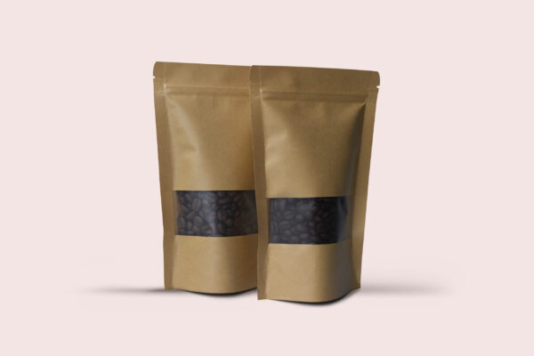 two blank brown kraft paper bag with coffee beans 2026 01 05 00 21 53 utc