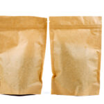 two brown paper packets on a white background 2026 01 11 11 10 51 utc