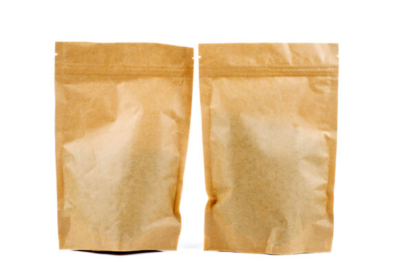 two brown paper packets on a white background 2026 01 11 11 10 51 utc