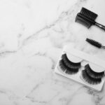 artificial eyelashes and accessories on marble bac 2026 03 08 23 04 36 utc