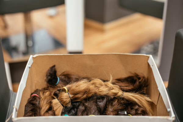 box of braided hair for cancer donation 2026 03 09 09 01 21 utc