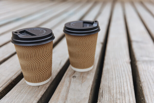 brown ripple paper cups of hot aroma coffee with b 2026 01 07 05 34 02 utc