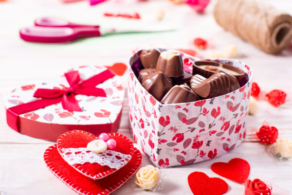 chokolate box in shape of heart on white wooden ta 2026 01 07 01 38 30 utc