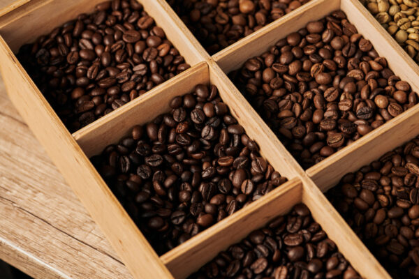 coffee beans in wooden box dark roast caffeine a 2026 01 05 23 40 00 utc