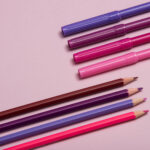 colourful pencils over a pink background 2026 03 17 08 25 17 utc