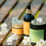 cosmetic jar on wooden table in blooming tree spri 2026 01 05 04 45 53 utc