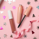 cosmetics and christmas accessories on pink backgr 2026 03 24 22 22 58 utc