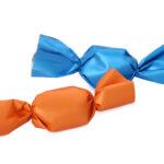 delicious candies in colorful wrappers on white ba 2026 02 19 19 43 19 utc
