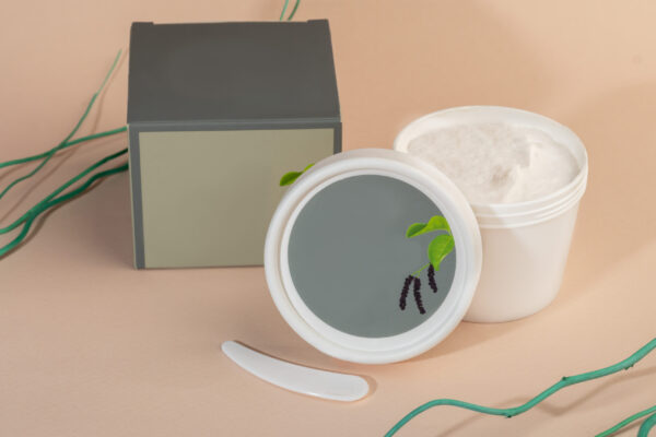 face mask with spatula on light background cosmet 2026 01 07 00 16 48 utc