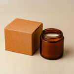 glass candle jar and cardboard box on beige backgr 2026 01 08 05 56 29 utc