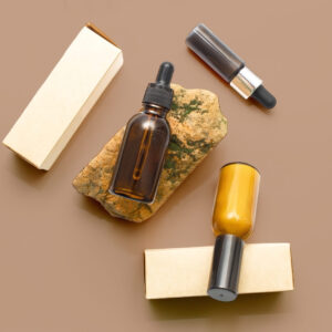 glass cosmetic bottles with a dropper on a beige b 2026 01 06 09 13 59 utc