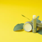 hygienic lipstick and lip balm on yellow backgroun 2026 03 24 23 11 58 utc