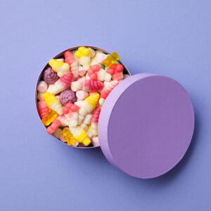 jelly candies in box on purple background top vie 2026 01 09 07 57 17 utc