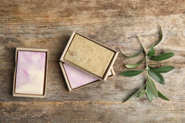 packed handmade soap bars and olive twig on wooden 2026 03 05 11 45 47 utc