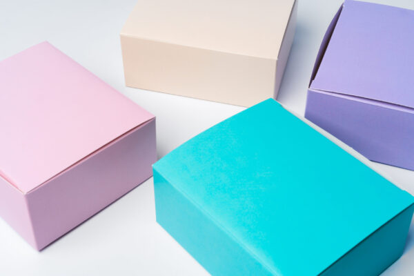 pile of colorful cardboard boxes on white backgrou 2026 03 19 07 45 56 utc