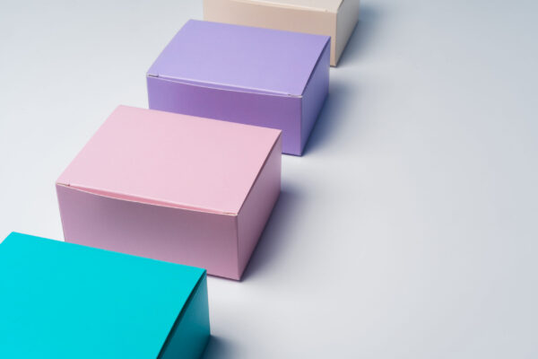 pile of colorful cardboard boxes on white backgrou 2026 03 24 00 10 08 utc