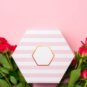 pink roses and gift box top view 2026 03 19 03 58 11 utc