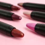 set of bright lipsticks in black tubes on pink bac 2026 03 20 20 16 05 utc