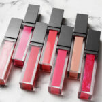 set of different liquid lipsticks on marble table 2026 03 13 15 43 17 utc