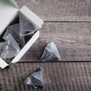 tea bag shape of pyramid in paper packaging box on 2026 03 24 09 01 12 utc