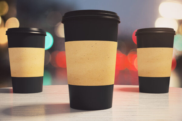 three black paper coffee cup on a table in a cafe 2026 01 11 08 48 16 utc