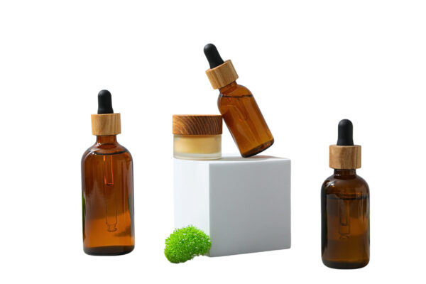 three bottles and cream jar shown isolated on whi 2026 01 09 10 54 49 utc