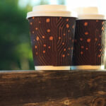 two coffee cups balcony natural light blurred back 2026 01 07 07 38 34 utc