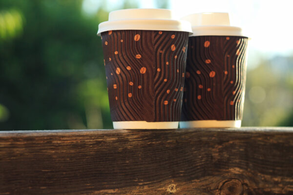 two coffee cups balcony natural light blurred back 2026 01 07 07 38 34 utc