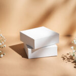 two white square box on a beige background with gy 2026 03 25 22 42 58 utc