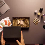 unboxing gift hamper on office desk with laptop an 2026 03 25 03 54 48 utc