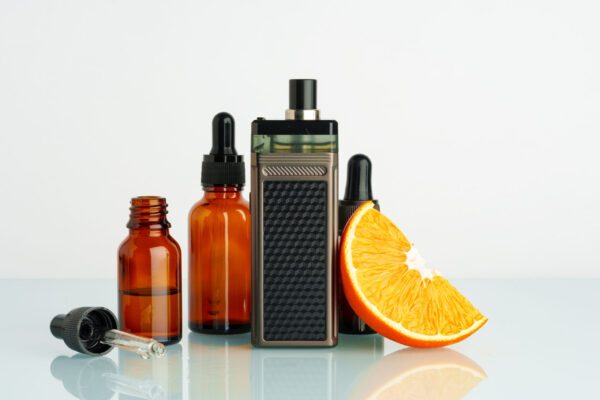 vape liquid with orange flavor on white background 2026 01 08 06 02 07 utc