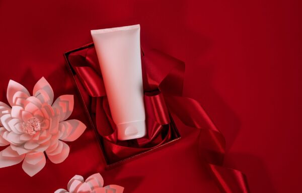 white bottle cosmetic product in red giftbox and o 2026 03 16 22 56 40 utc