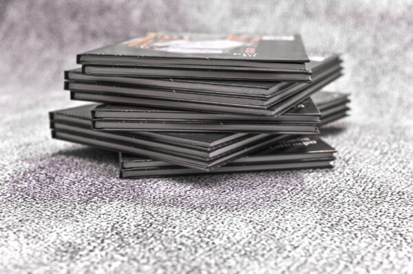a large stack of paper photo books photo album wi 2026 03 25 06 37 34 utc