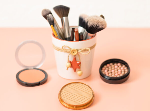 a set of cosmetics on a pink background with a chr 2026 03 20 00 37 44 utc