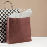 arrangement of shopping bags on beige background 2026 03 24 11 43 20 utc