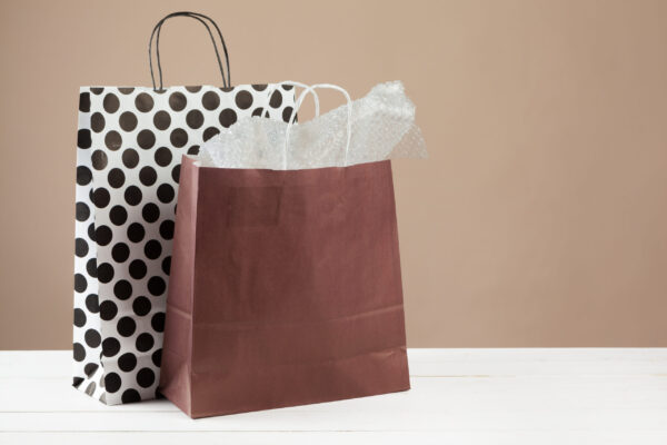 arrangement of shopping bags on beige background 2026 03 24 11 43 20 utc