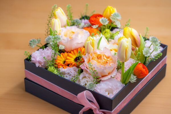 box of different flower on the table 2026 03 24 15 20 41 utc