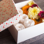 box with white zephyr and sunflowers and chrysanth 2026 03 24 07 41 43 utc