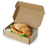 carton box with croissant sandwich isolated on whi 2026 01 09 07 06 57 utc